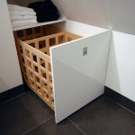 Wasmand verwerkt in een ladekastje.